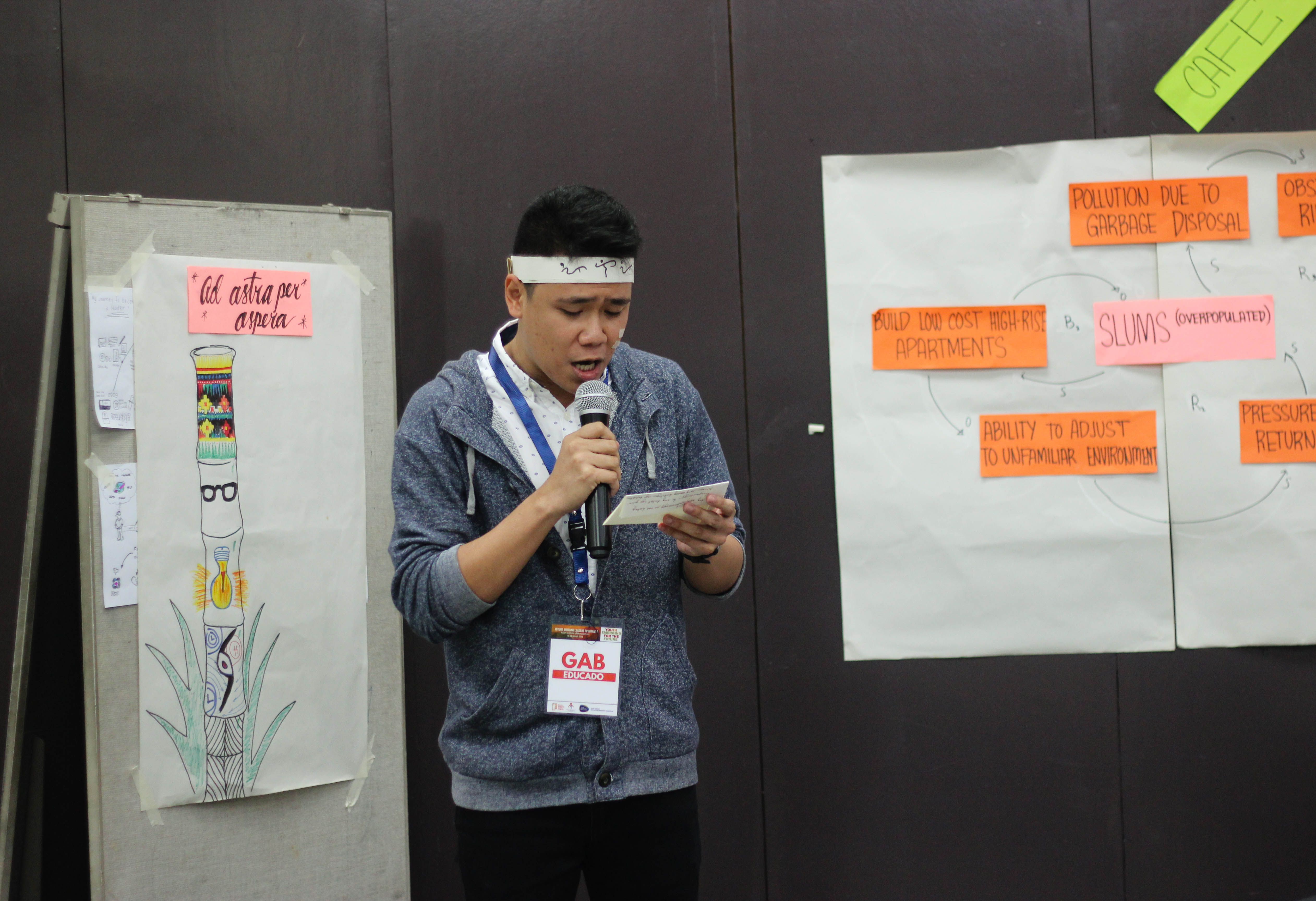 Gab Educado, a fellow, presenting his group’s outputs for a collaborative activity.