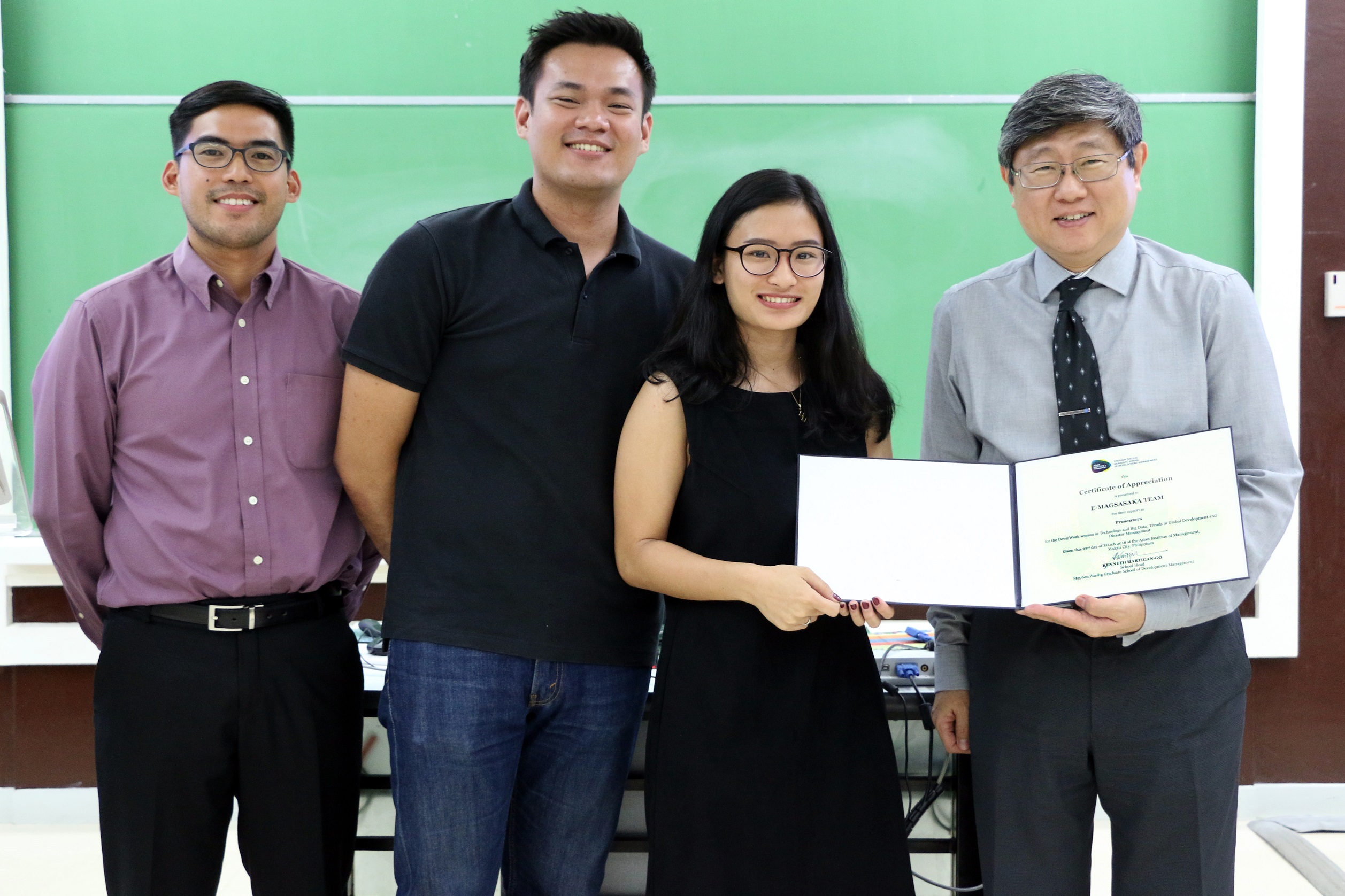 (From left) Jose Gabriel Dimalanta, Aaron David, Aiah Sarmiento, and Prof. Kenneth Hartigan-Go at the end of the Dev@Work session.