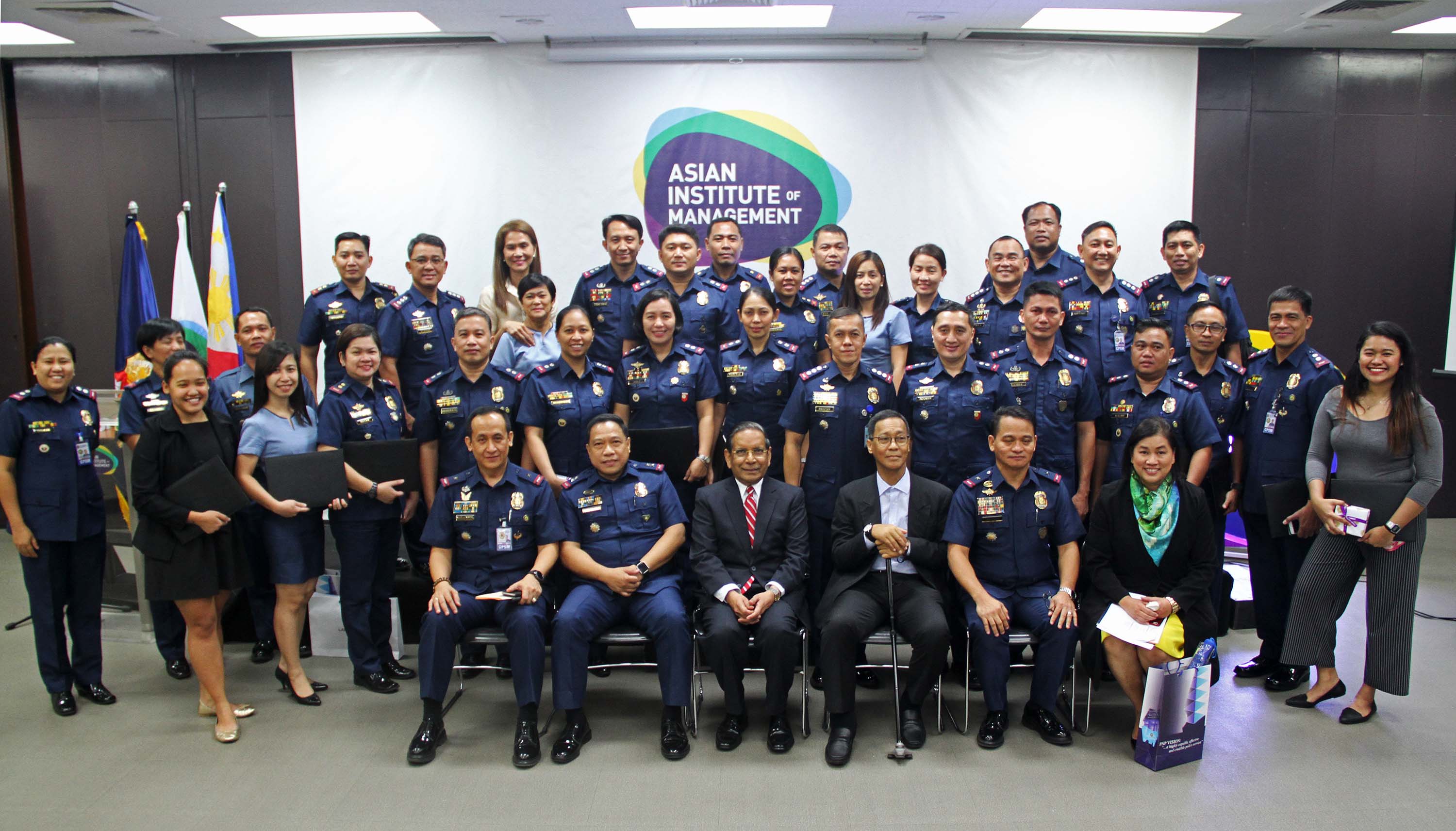 PNP officers complete Results-based Management program at AIM