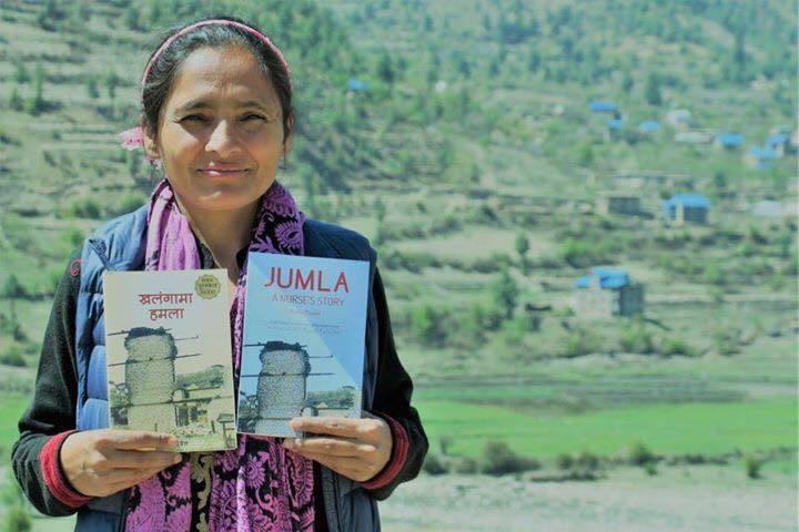 Radha Paudel posing with her book, ‘Khalangama Hamala’ (English title, ‘JUMLA: A Nurse’s Story’).