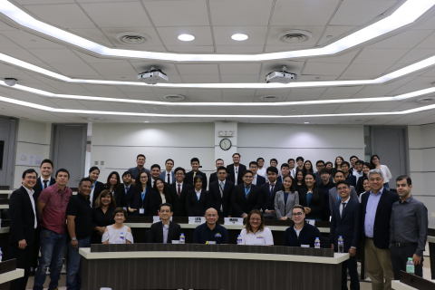 Professor Matthew Escobido (leftmost) with the students and professors of the Master of Science in Innovation and Business program and officials of Barangay Poblacion.