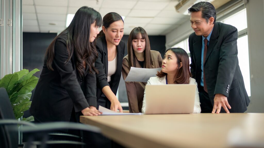 young business people discussing and brainstorming at modern office