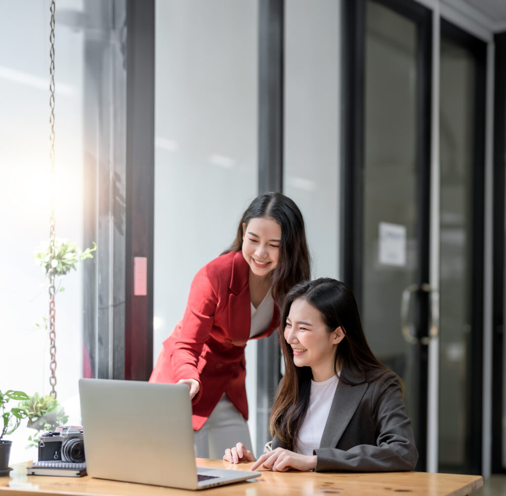 Two,Young,Asian,Businesswoman,Discuss,With,New,Startup,Project,Idea