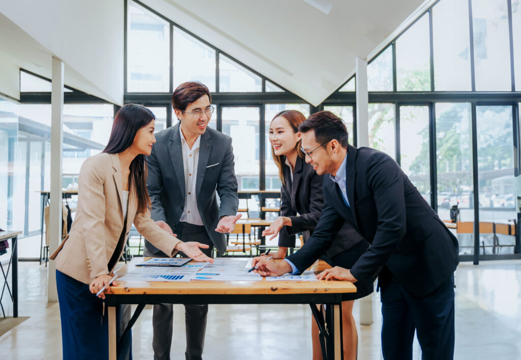 Business,Related,Meeting,Asian,Business,Team,Discusses,Strategy,For,Starting