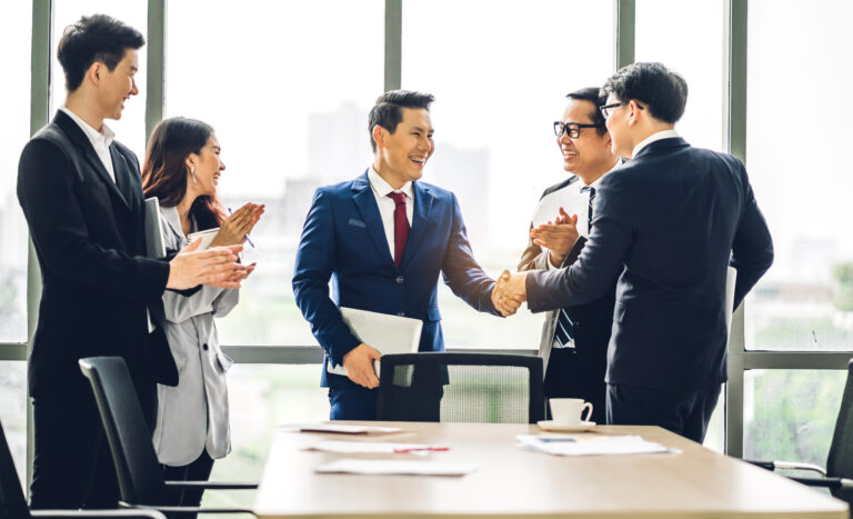 Image,Two,Asian,Business,Partners,In,Elegant,Suit,Successful,Handshake