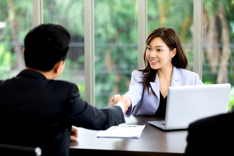 Asian,Business,Woman,Shaking,Hands,After,A,Successful,Job,Interview