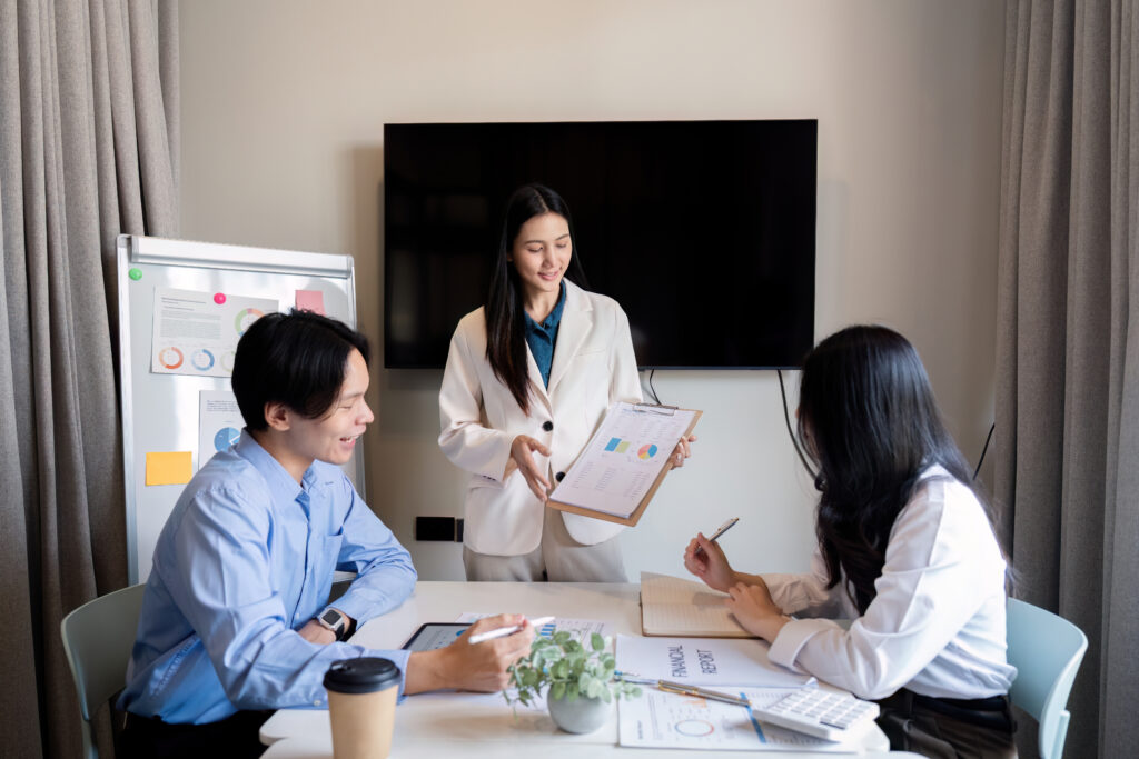 Business meeting to analyze and discuss the situation on the financial report in the meeting room. Investment Consultant, Financial advisor and accounting concept