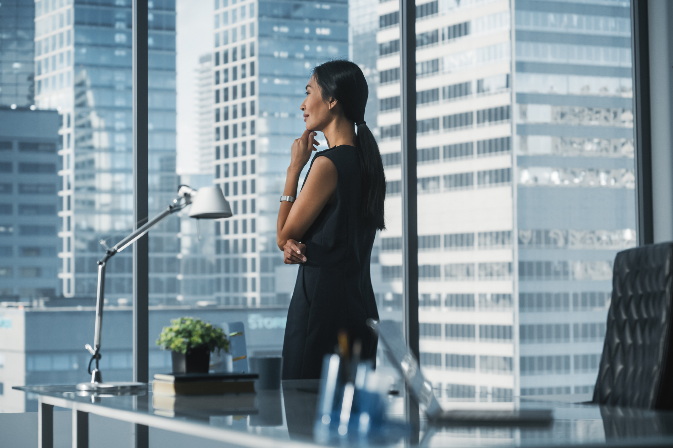 Successful,Businesswoman,In,Stylish,Dress,Working,On,Laptop,,Looking,Out