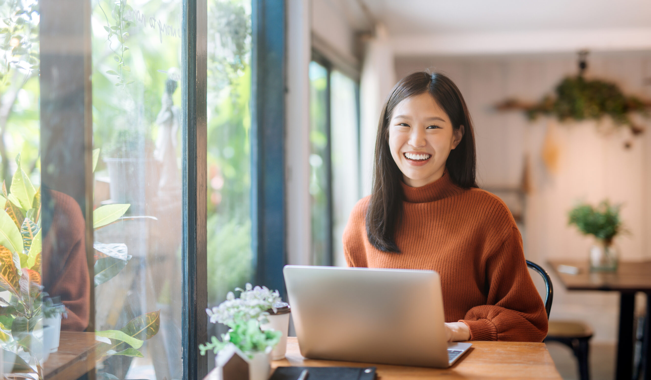 an executive mba student using her laptop