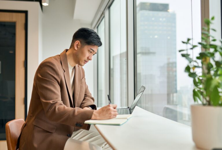 an omba student studying