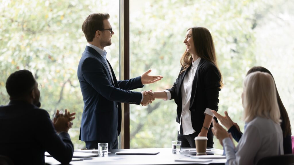 professionals congratulating each other