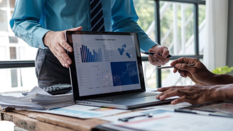 finance specialist discussing different graphs