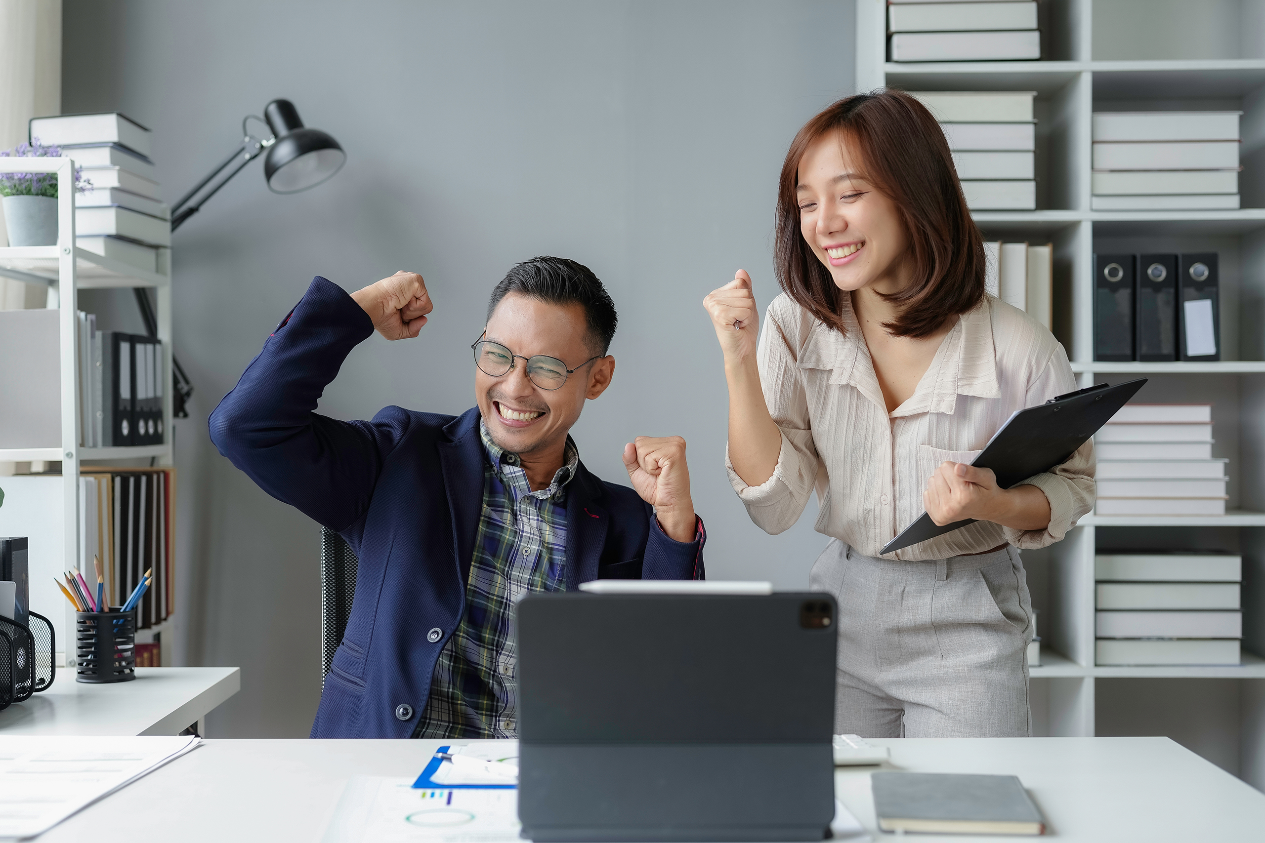 two professionals cheering