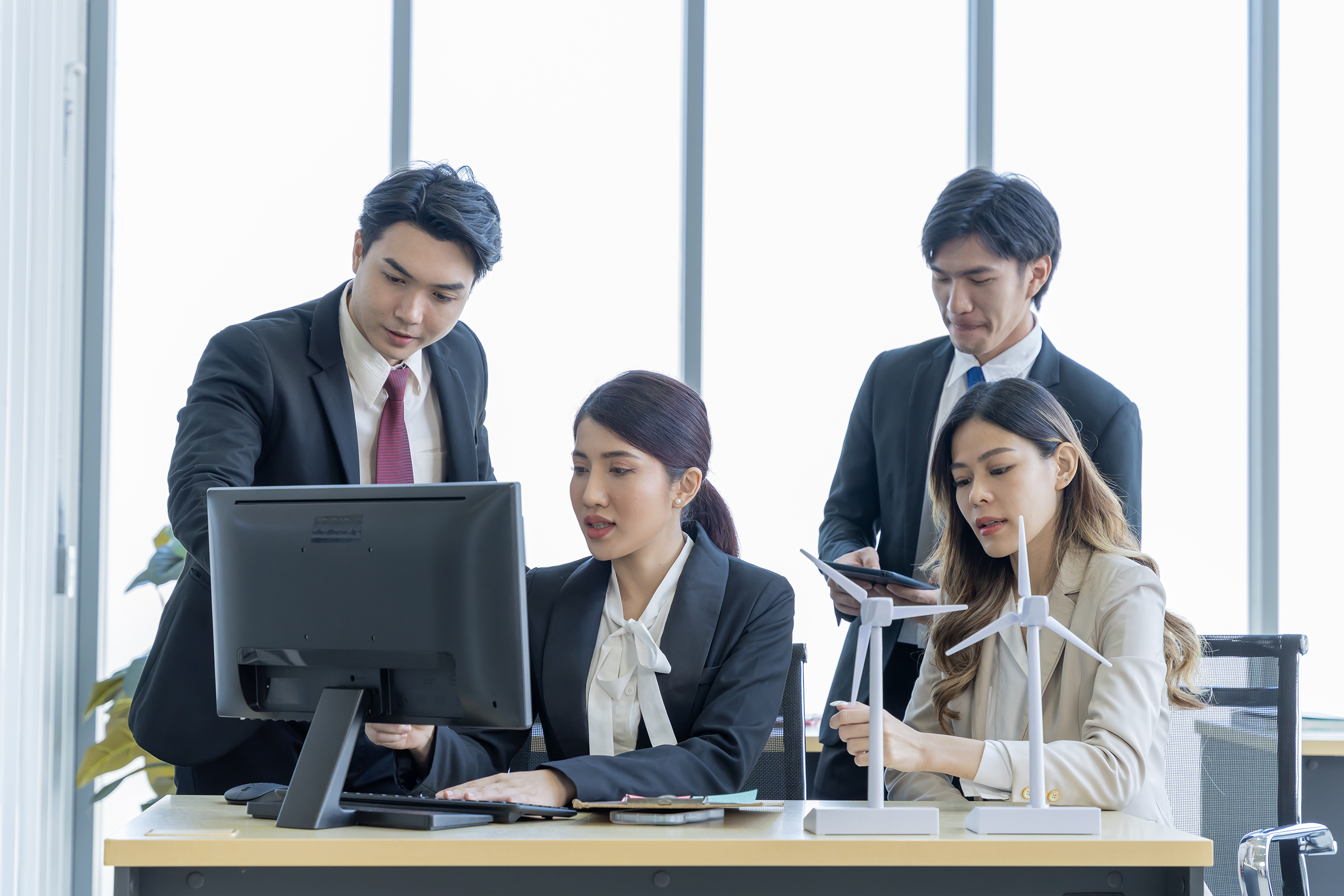 A group of young Asian businessmen