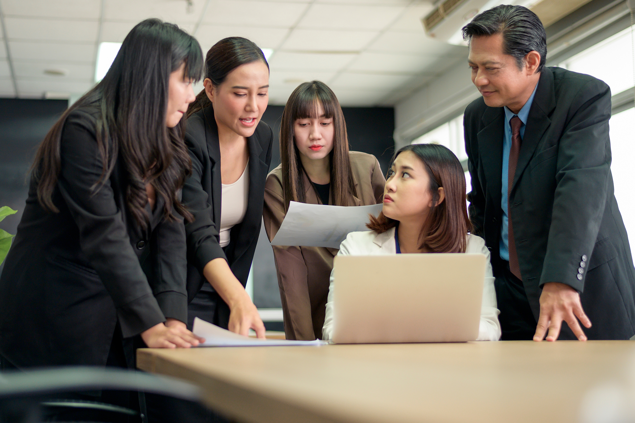 young business people discussing and brainstorming at modern office
