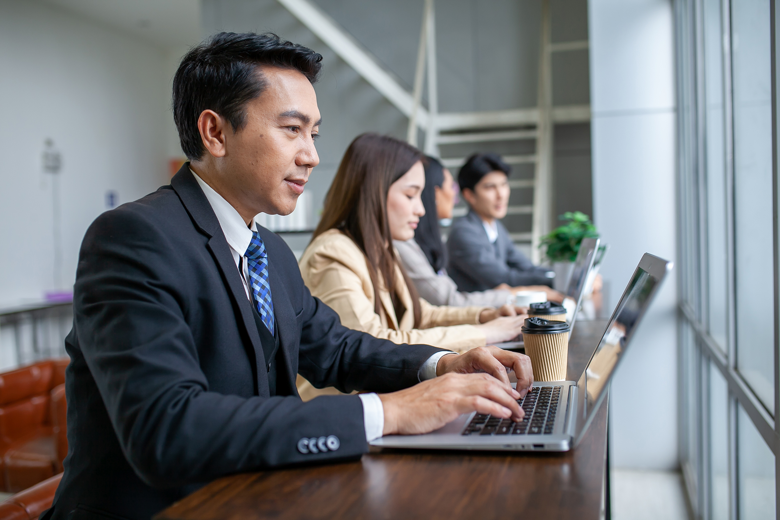 Portrait of Asian middle age businessman working at the office,