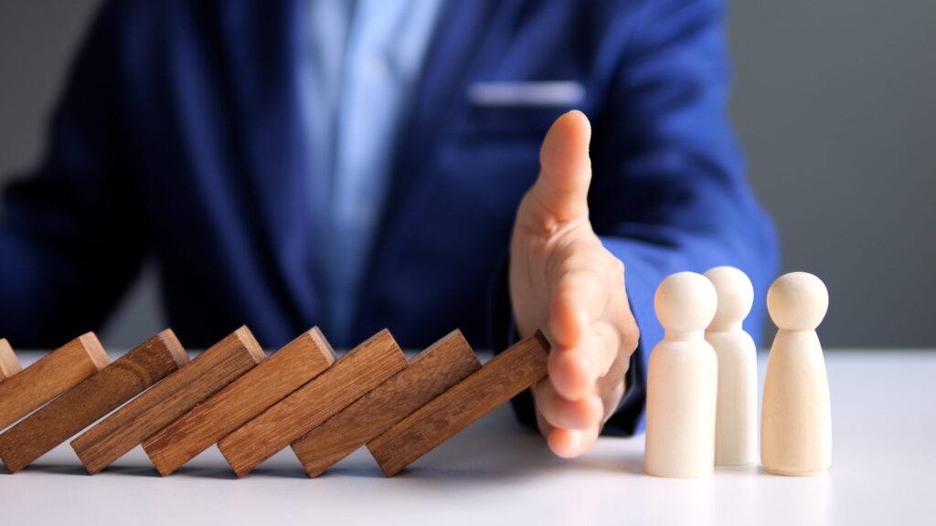miniblocks being saved by a hand from falling